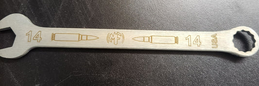 A silver 14mm wrench with markings and anti-spark zinc coating, indicating its specifications and material.